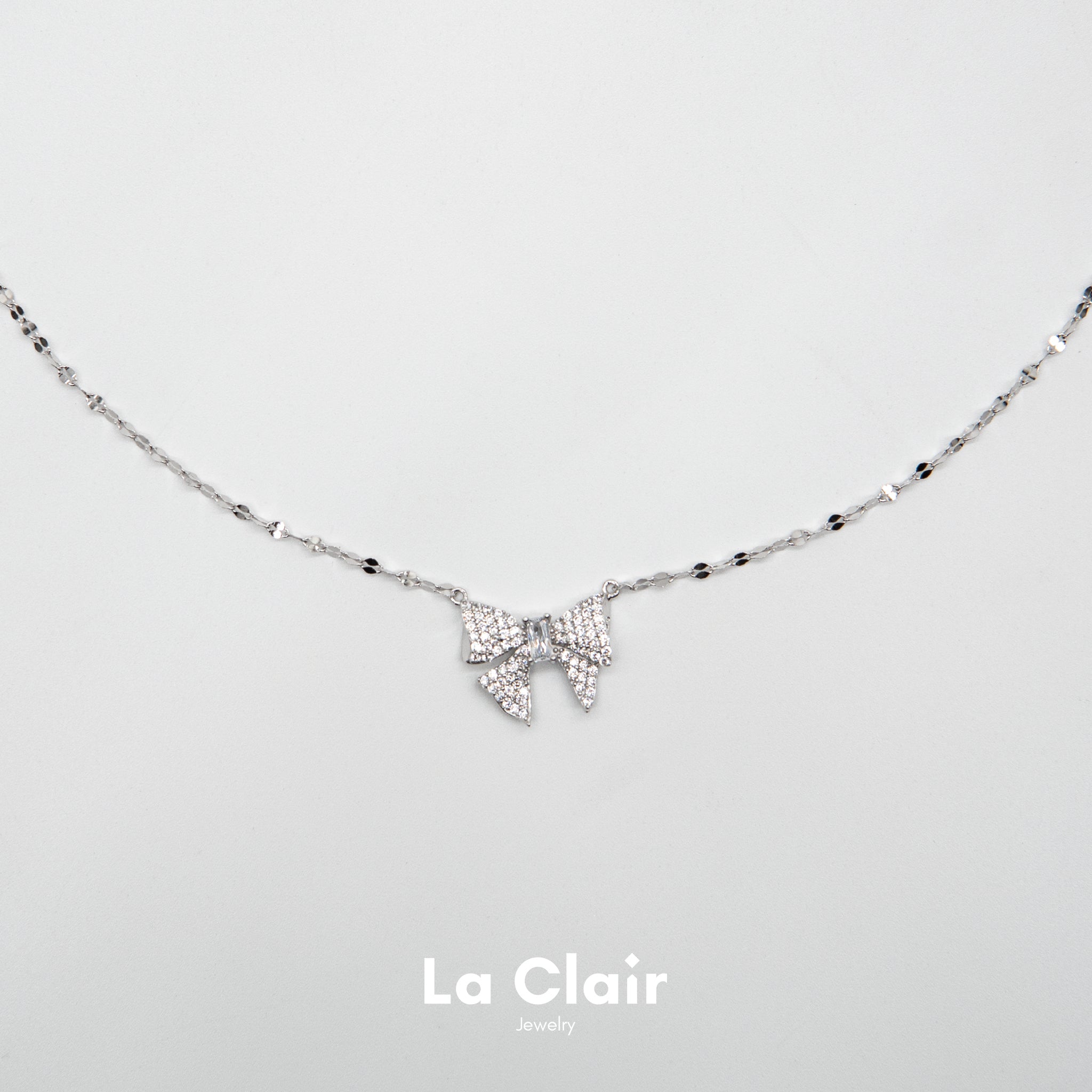 Silver Bow Tie Pendant Necklace