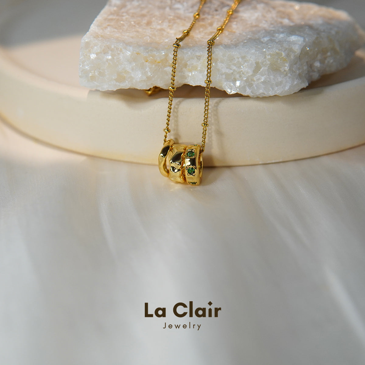 Emerald Three-Ring Pendant Necklace
