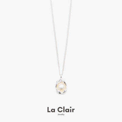 Silver Pearl-Adorned Egg Shape Necklace