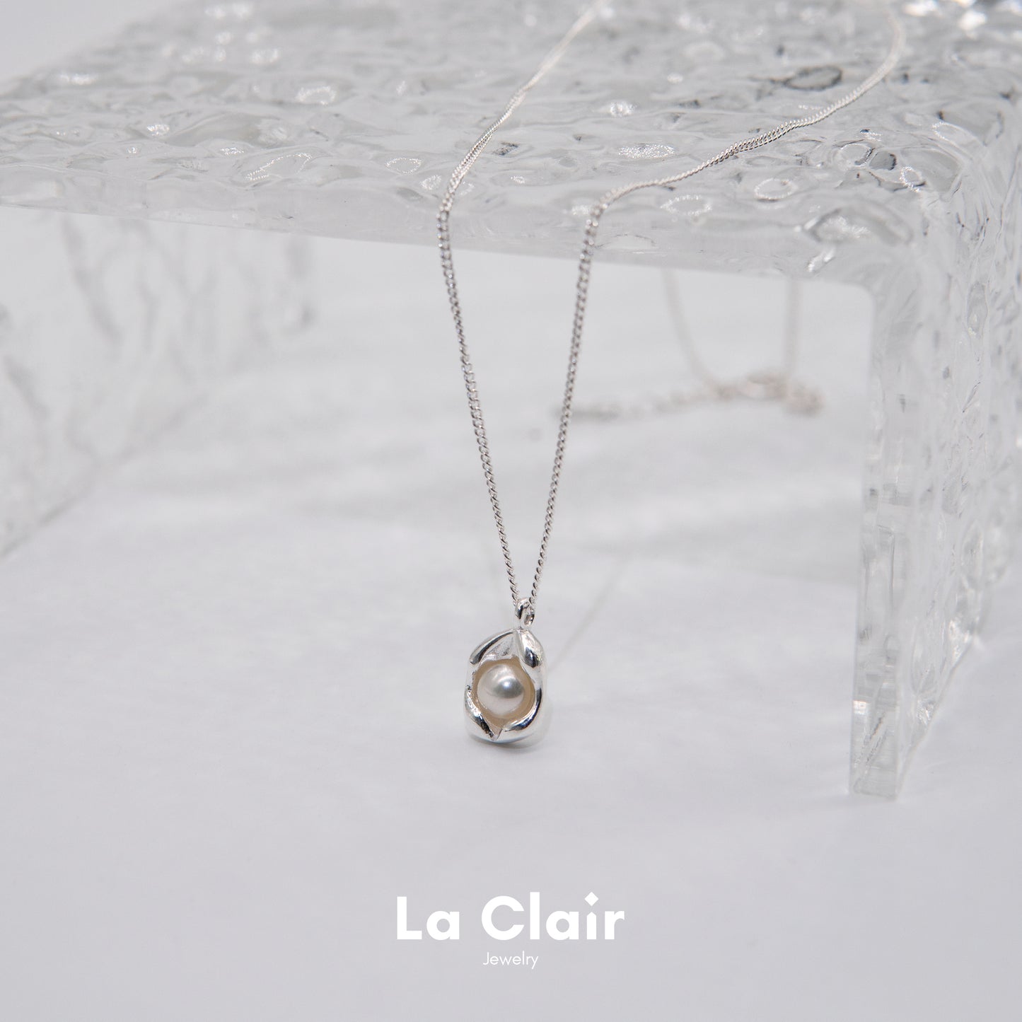 Silver Pearl-Adorned Egg Shape Necklace