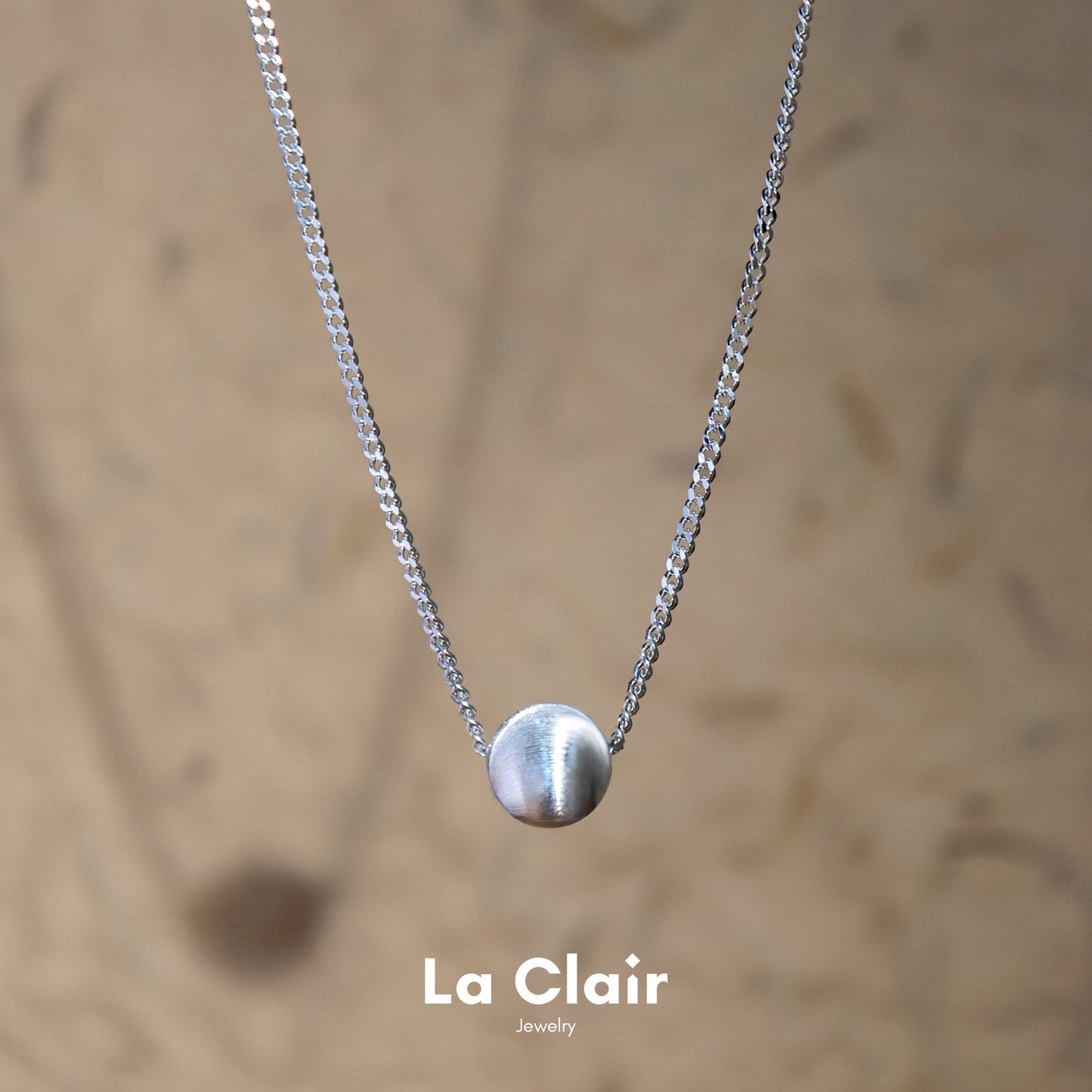 Silver Textured Sphere Pendant Necklace