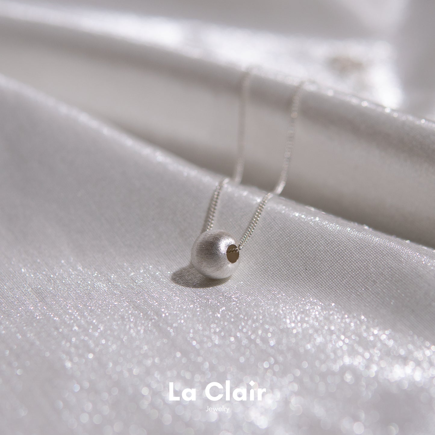 Silver Textured Sphere Pendant Necklace