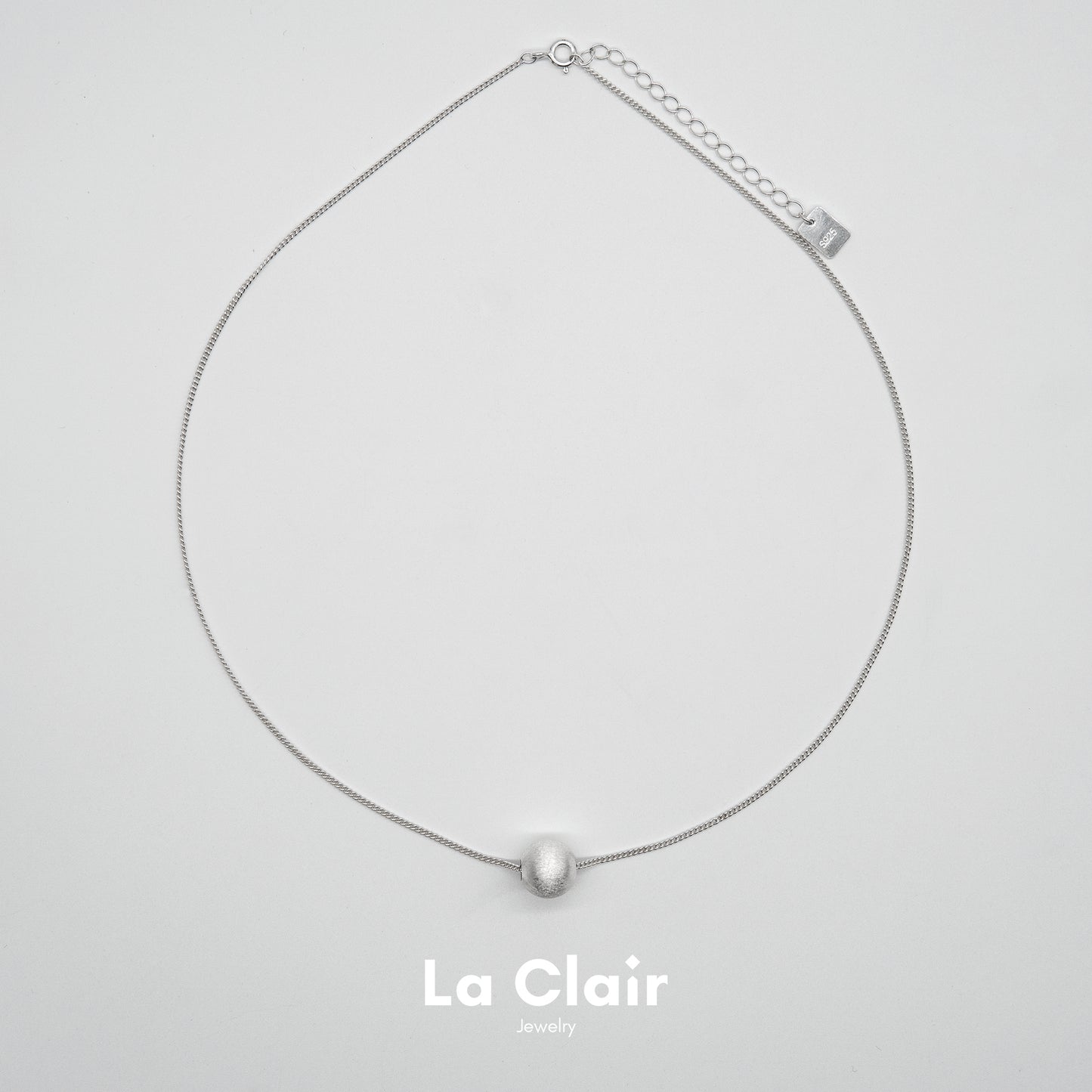 Silver Textured Sphere Pendant Necklace